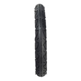 12-1/2x2-1/4 (57-203/62-203) Tire for the Schwinn S180 Scooter, featuring a close-up of a black tire with detailed tread patterns for enhanced traction.