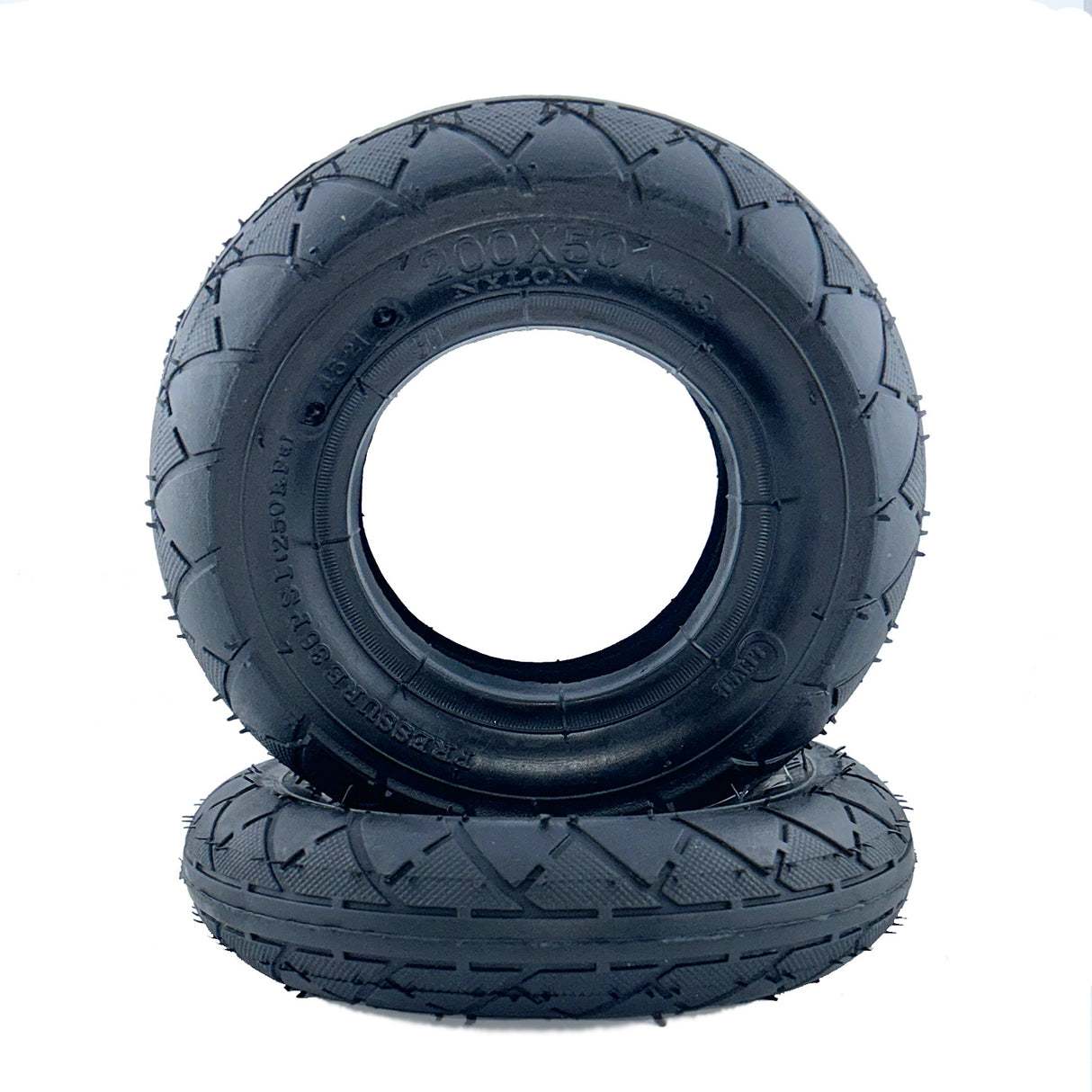 200x50 Tire for the Razor Crazy Cart XL with visible tread pattern, suitable for pavement. The image showcases the tire's size and design, reflecting its use in electric scooters.