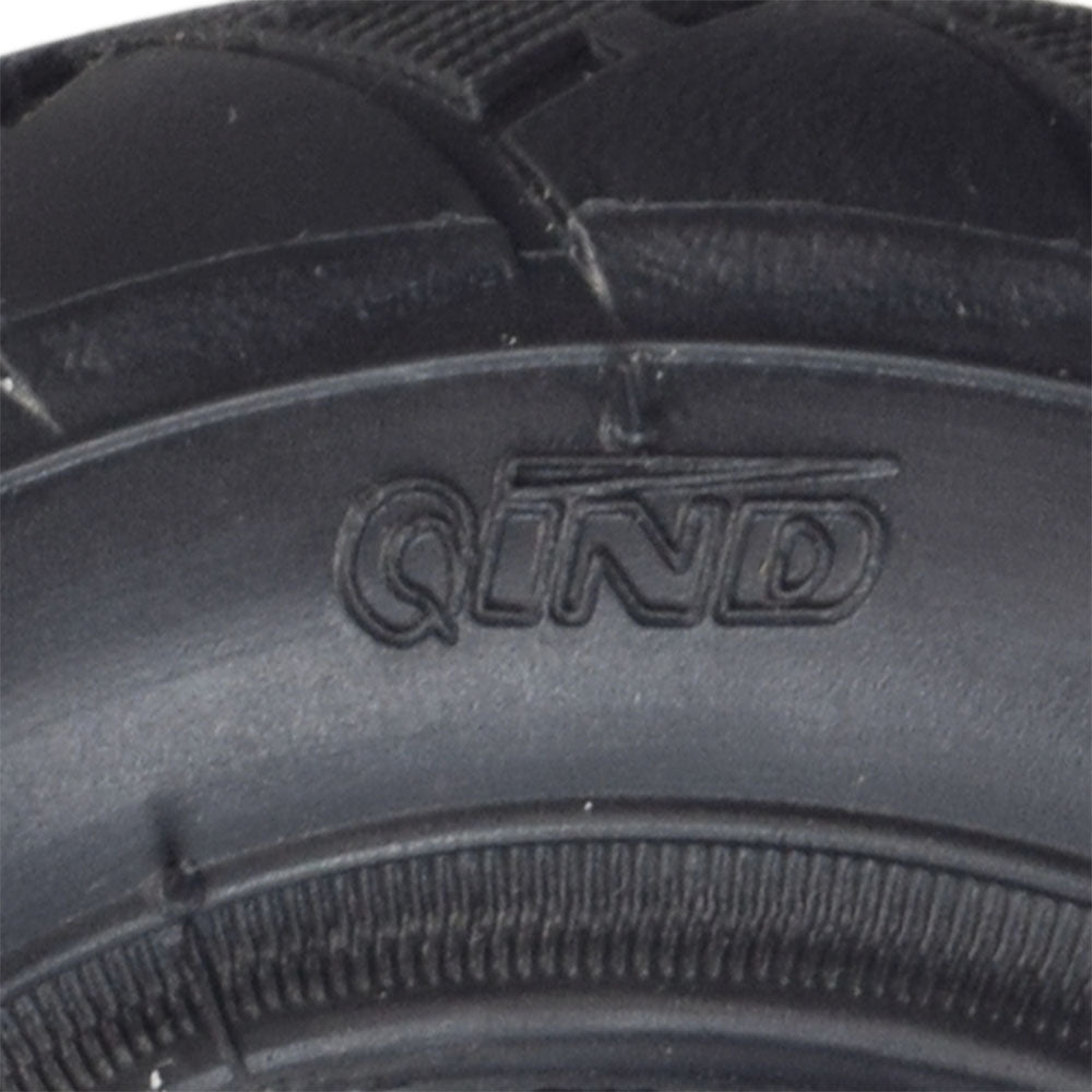 Close-up of a 200x50 tire for Razor E100, E100 Glow, and Power Core E100 electric scooters, showcasing the detailed tread pattern of the black rubber surface.