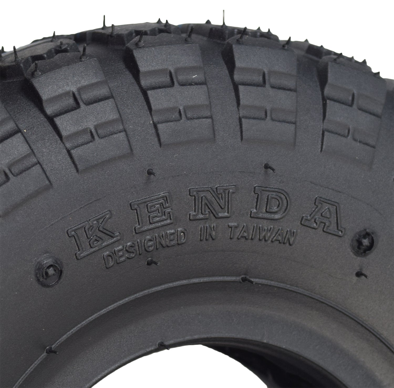 Close-up of a 4.10/3.50-4 Tire and Tube Set with Knobby Tread for Scooters and Mini ATVs, showing the aggressive knobby tread pattern and bundled inner tube.