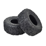 145/70-6 Off-Road Mini Bike Tires (Set of 2) featuring knobby and V-tread designs, ideal for dirt and mud riding, shown close-up to highlight tread patterns and durability.