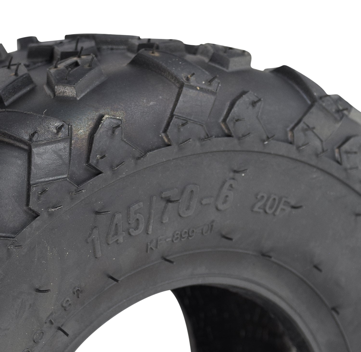 Close-up of the 145/70-6 Tire for Monster Moto / Mega Moto Classic 105cc & MM-B80 80cc Mini Bikes, showcasing its knobby tread pattern and robust design suitable for 6 rims.