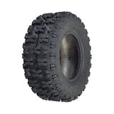 13x5.00-6 Dirt Bike & Mini Bike Tire with Q129 tread, showcasing a close-up of the aggressive tread pattern designed for superior grip on loose surfaces.