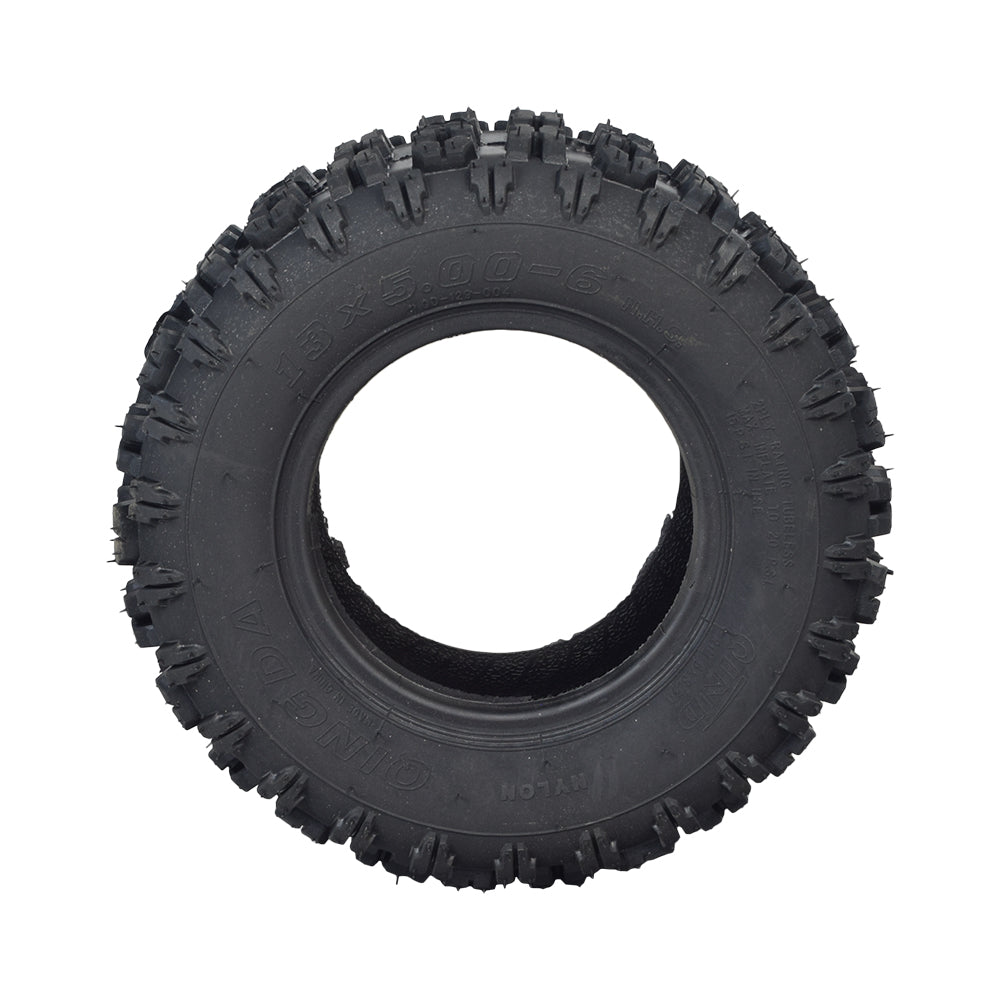 13x5.00-6 Monster Moto / Mega Moto Go-Kart Tire with an aggressive tread pattern suitable for dirt tracks and blacktop, featuring a tubeless design and a central hole. Perfect for off-road karts and ATVs.