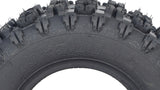 Close-up of the 13x5.00-6 ATV, Go-Kart, & Dune Buggy Tire with Q129 Tread, showcasing its aggressive tread pattern designed for superior grip on loose surfaces.