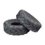 A pair of 19x7.00-8 Off-Road Mini Bike Tires with distinct treads, ideal for varied terrains including mud, sand, and hard surfaces.