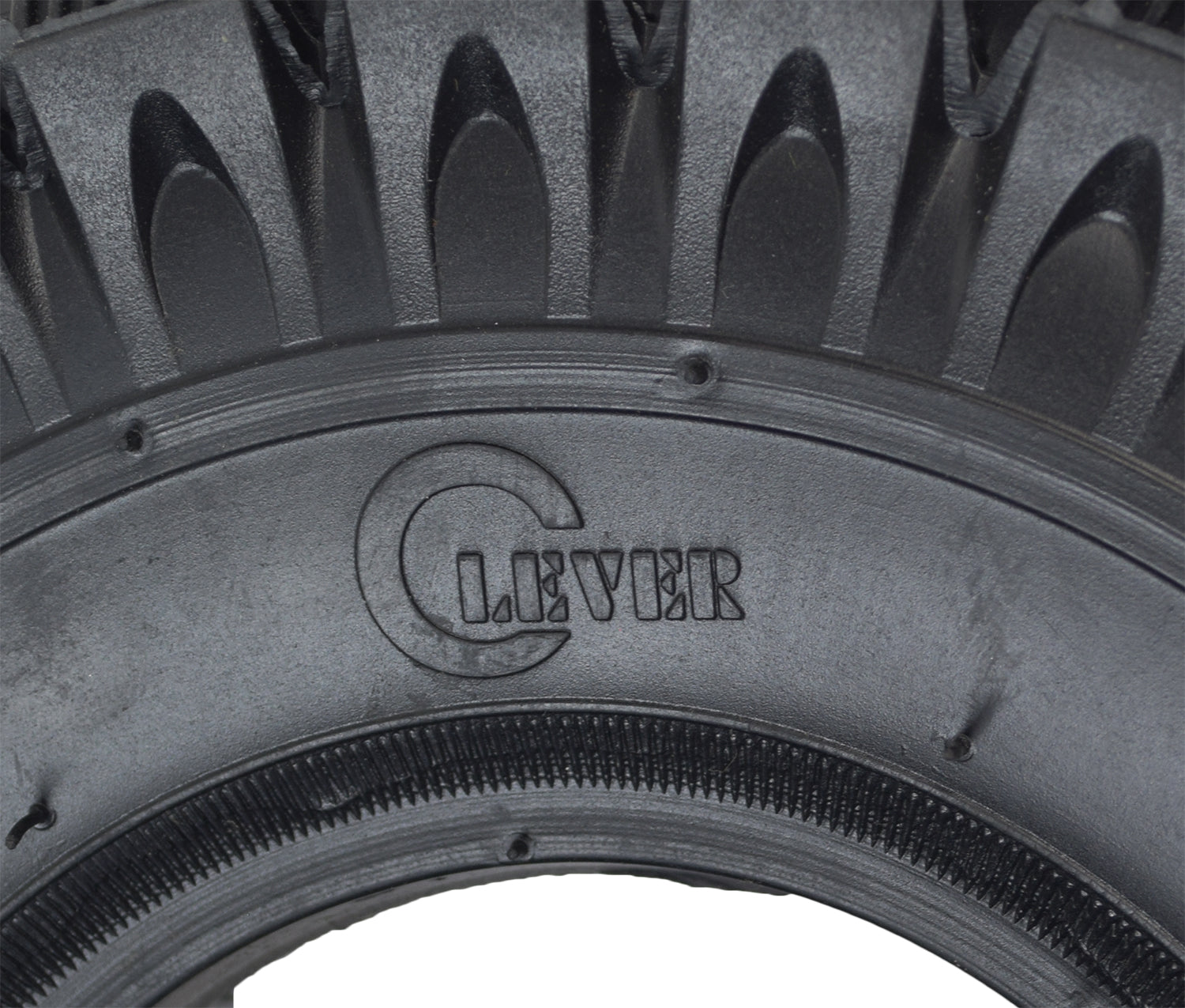 Close-up of a 10x3 (3.00-4, 260x85) Scooter, ATV, & Go Kart Tire with Q113 Knobby Tread, showing detailed tread pattern for enhanced off-road traction.