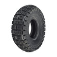 10x3 (3.00-4, 260x85) Knobby Tire for Avigo Extreme Dirt Rider SC 3500 & Surge 36 Volt Off-road Electric Scooters, featuring aggressive tread for enhanced off-road traction, displayed with central hole.