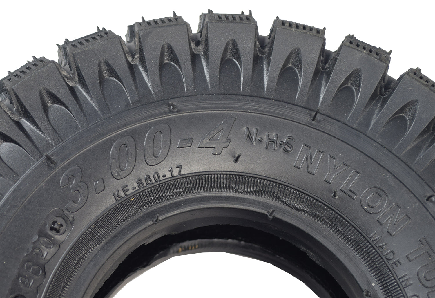 Close-up of the 10x3 (3.00-4, 260x85) Scooter, ATV, & Go Kart Tire with Q113 Knobby Tread, showing rugged, knobby patterns designed for enhanced off-road traction.