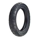 12-1/2x2-1/4 (57-203/62-203) Kick Scooter Tire with Wide Tread, showcasing a close-up of the black tread pattern designed for enhanced grip on sandy surfaces. Ideal for beach cruiser-style kick scooters.