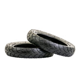 12-1/2x2-1/4 (57-203/62-203) Kick Scooter Tire with Wide Tread, featuring a close-up of two black tires with low-siped treads, ideal for beach cruiser-style scooters.