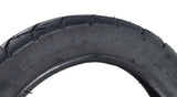 12-1/2x2-1/4 (57-203/62-203) Scooter Tire with Wide Tread. Close-up shows black rubber tire with detailed tread and visible branding, ideal for Razor Pocket Mod, Sport Mod, and Dynacraft Hello Kitty scooters.