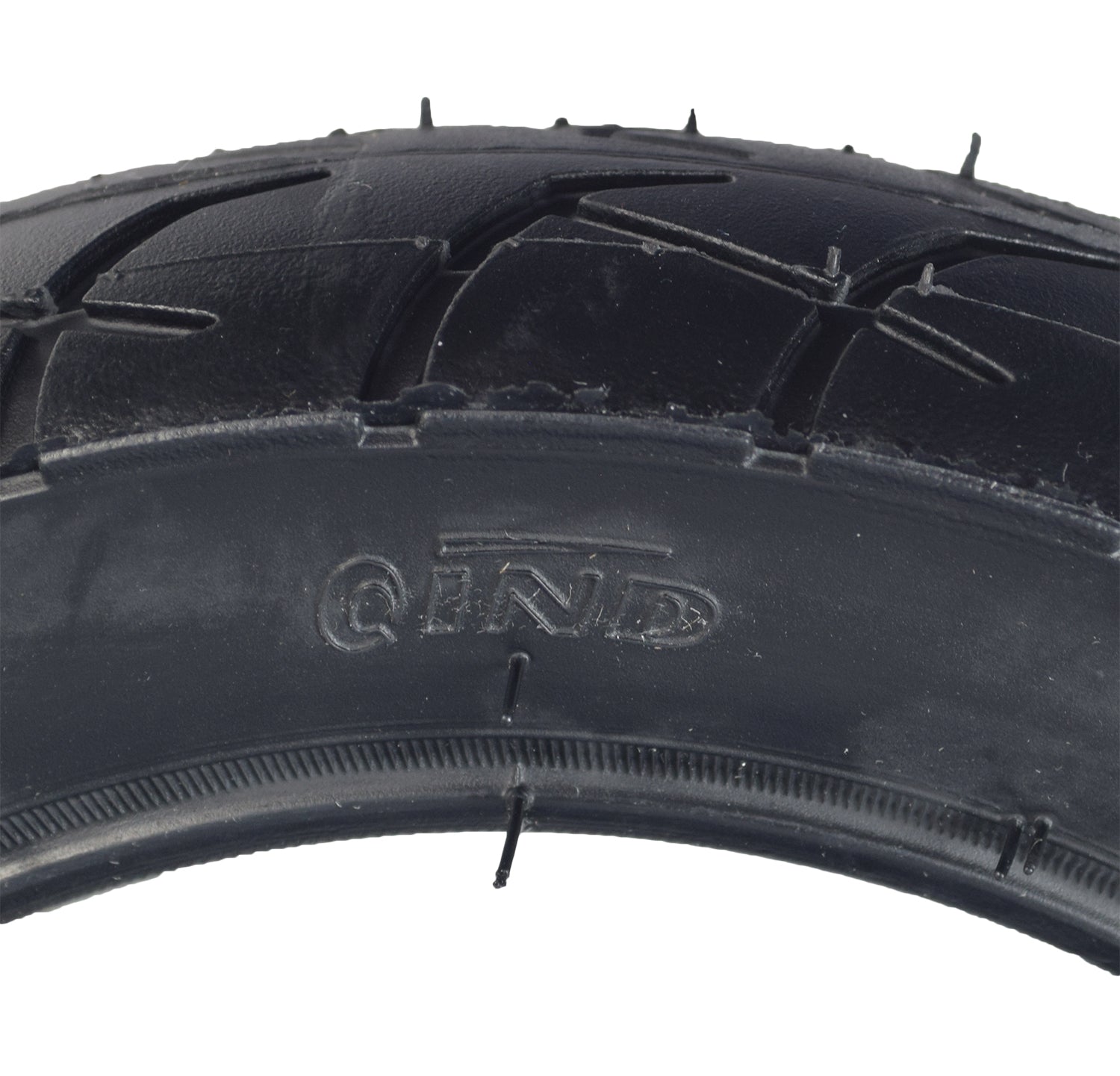 Close-up of the 12-1/2x2-1/4 (57-203/62-203) Kick Scooter Tire with Wide Tread, showcasing its low-siped pattern and sturdy, wide tread design for optimal performance on sandy surfaces.