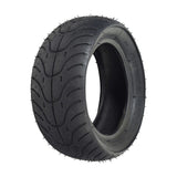 110/50-6.5 Tire for the MotoTec MT-MB 24 Volt Electric Mini Bike, showcasing shallow grooved tread and black rim, ideal for maintaining excellent traction on various surfaces.