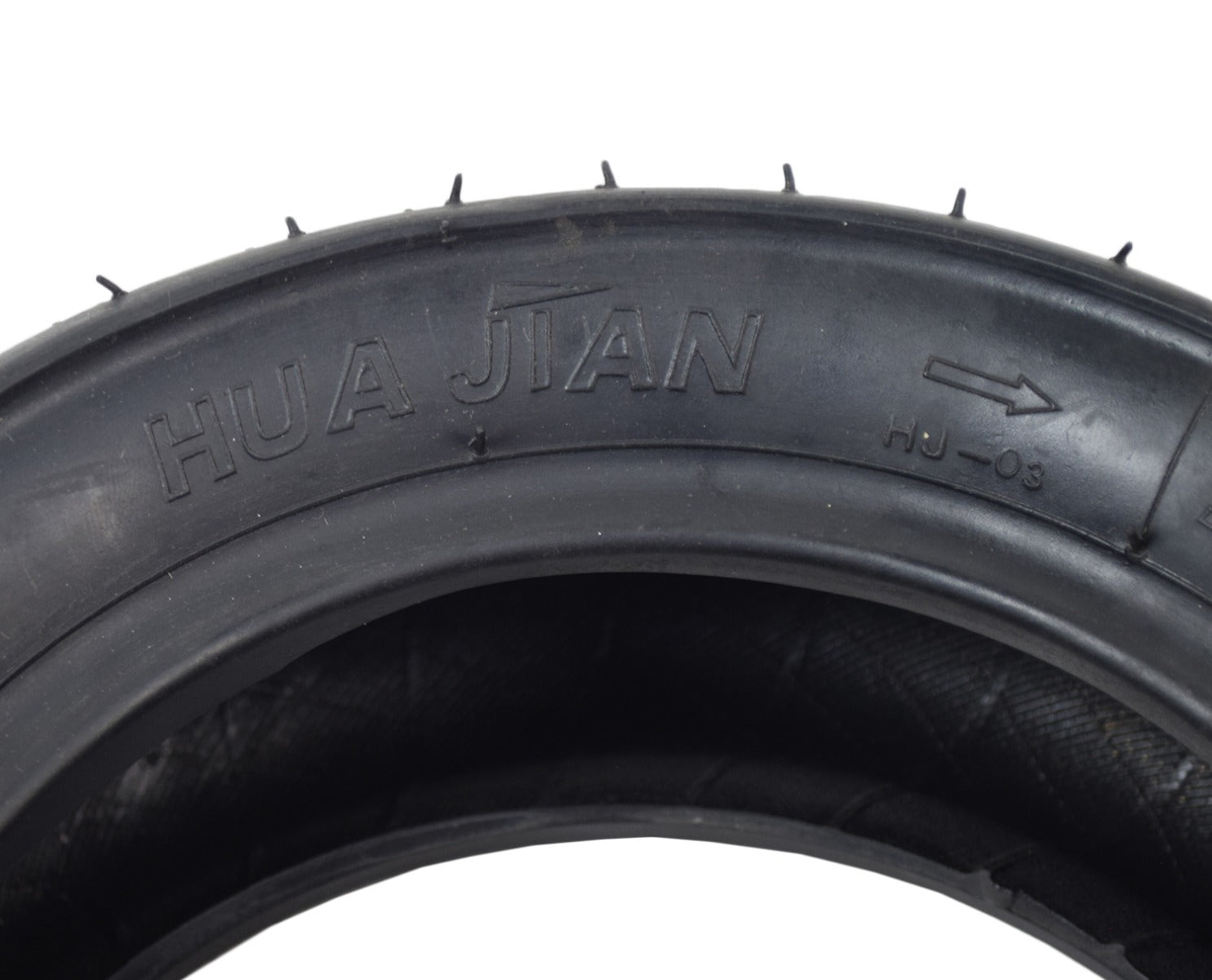 110/50-6.5 Tire for the MotoTec MT-MB 24 Volt Electric Mini Bike, close-up showing shallow grooved tread for traction, and clear sidewall text.