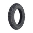 10x2 (54-152) Dirt Bike & Scooter Tire with KF709 Tread, showing a close-up of the mildly aggressive tread pattern, ideal for maintaining control while kicking up dust.