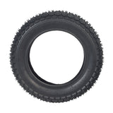 10x2 (54-152) Dirt Bike & Scooter Tire with KF709 Tread, featuring a spiked tread pattern for enhanced control on dirt surfaces.