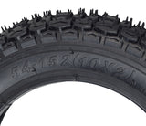 Close-up of the 10x2 (54-152) Dirt Bike & Scooter Tire with KF709 Tread, showcasing the detailed tread pattern designed for enhanced control on rough terrains.