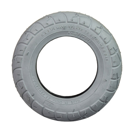 6 x 1-1/4 (150x30) Pneumatic Mobility Tire with K671 Slick Tread, featuring a circular hole at the center and a lightly grooved tread for water dispersion, suitable for scooters and power chairs.