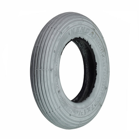 7x1-3/4 Pneumatic Mobility Tire with K301 Ribbed Tread, a grey, air-filled tire suitable for mobility scooters and wheelchairs, featuring a hole in the middle and non-marking rubber.