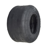 10x4.50-5 Tubeless Slick Tire for Drift Trikes & Go-Karts, a black, treadless tire with a central hole, designed for high-speed, low-traction performance and easy fitting with a drift sleeve.