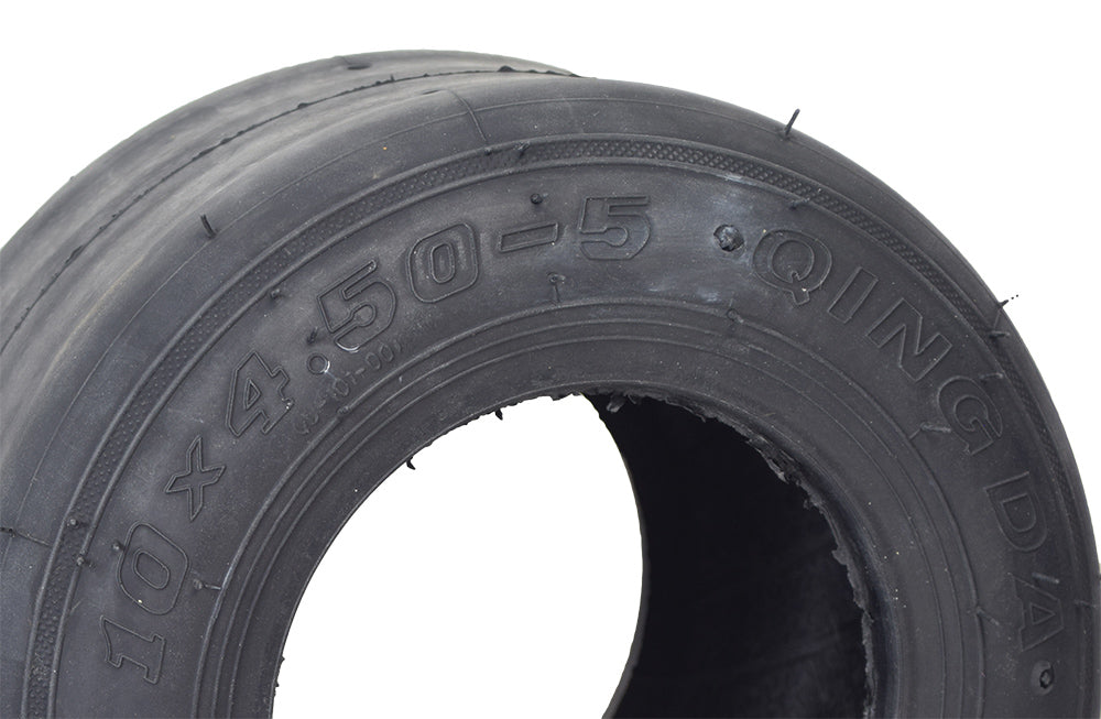 10x4.50-5 Tubeless Slick Tire for the Coleman DT200 Drift Trike, black with treadless design and visible numbers and letters, featuring a central hole and small indentations for easy drift sleeve fitting.