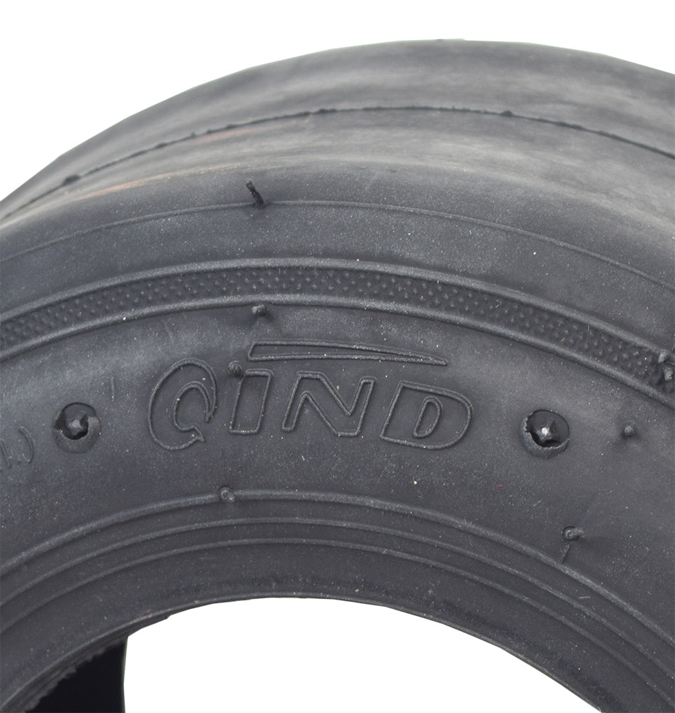 Close-up of the 10x4.50-5 Tubeless Slick Tire for Drift Trikes & Go-Karts, highlighting its smooth, treadless surface designed for high-speed performance and easy fitting with a drift sleeve.