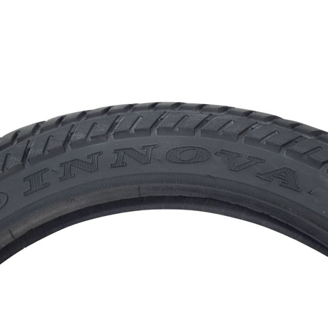 Close-up of the 16x2.50 (64-305) Tire for X-Treme Electric Scooters & Bikes, showcasing its all-season tread pattern and directional arrows on the sidewall for proper mounting direction.