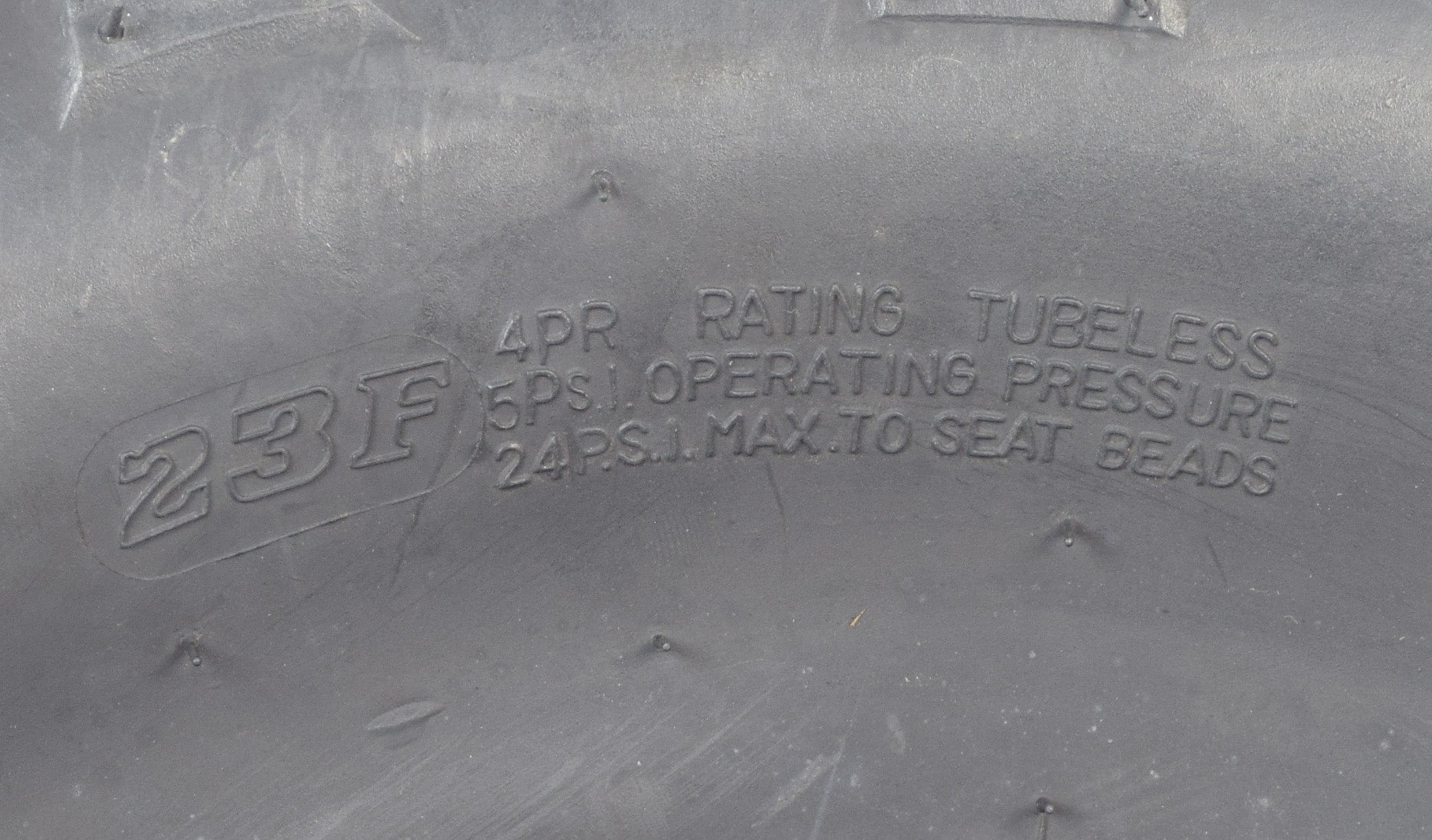 Close-up of the 20x7.00-8 Tire with V-Tread for Hammerhead Go-Karts, showcasing aggressive V-tread pattern designed for optimal traction on various surfaces like mud, grass, and hard-packed dirt.