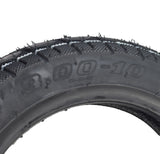 Close-up of a 3.00-10 (16x3) Pneumatic Tire for Pride Raptor & Baja Raptor 2 Scooters, showcasing its shallow-siped tread and smooth surface for enhanced maneuverability and dependability.