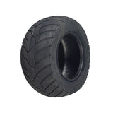 13x5.00-6 Tubeless Pneumatic Tire for the MotoTec Off Road 48V 1000W Go-Kart, shown close-up, highlighting the tread pattern and hole in the center, suitable for kid-size electric go-karts.