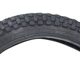 Close-up of a 16x2.50 (64-305) pneumatic tire for scooters & jogging strollers with HJ308 tread pattern, highlighting directional arrows on the sidewall for proper mounting.