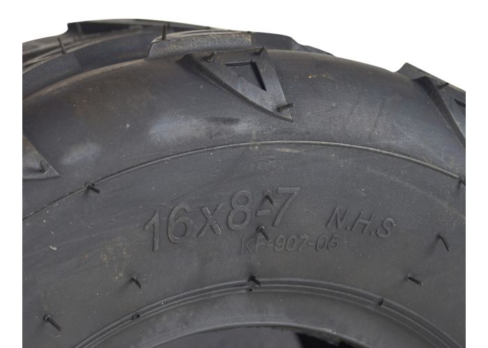 Close-up of a 16x8-7 rear tire with bold V-tread designed for the Realtree RTK200 go-kart, optimized for traction on loose surfaces like mud, sand, and gravel.