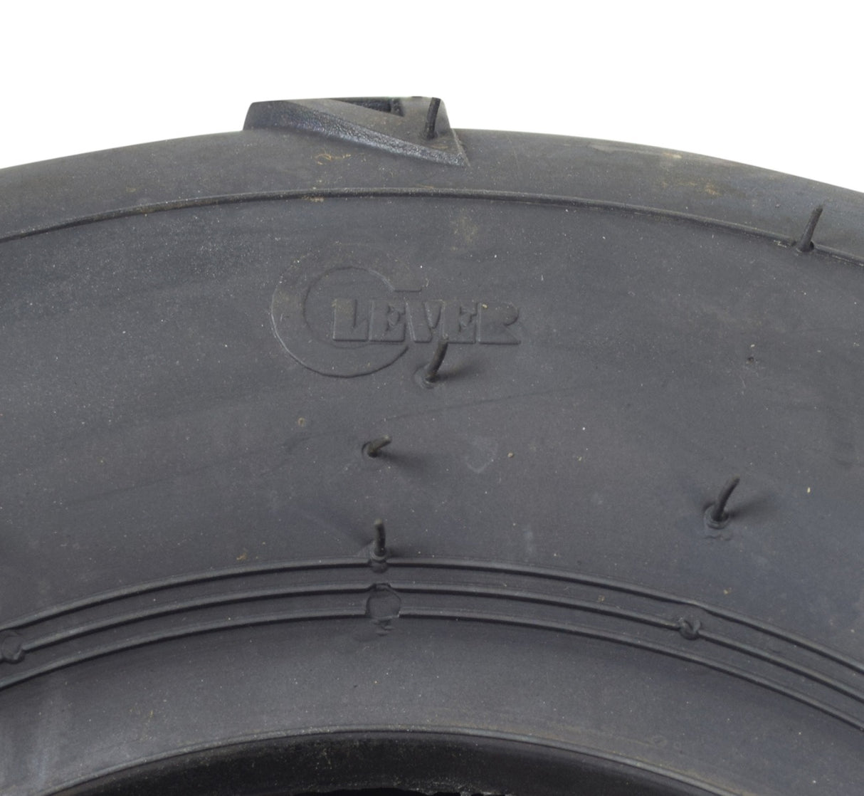 Close-up of the 16x8.00-7 V-Tread ATV & Go-Kart Tire showcasing its aggressive V-tread design, ideal for superior traction and control on various surfaces like mud, sand, and dirt.