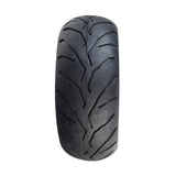 90/65-6.5 Pocket Bike Tire with shallow-siped street tread, suitable for X-Treme XP-700, XP-489, and similar models. Available with an optional inner tube featuring an angled valve stem.