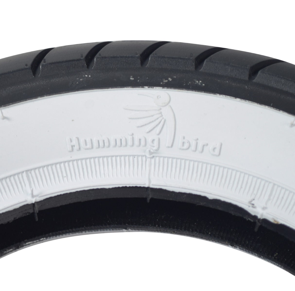 Close-up of the 10x2 Pneumatic Whitewall Tire for the Razor Pocket Mod Petite, highlighting the retro-style whitewall side and shallow-siped street tread, reminiscent of classic Euroscooters.