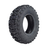 4.10-6 ATV & Mini Bike Tire, featuring a black rim and aggressive tread pattern, designed for superior grip on loose surfaces. Ideal for front rims of small recreational offroad models.