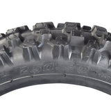 2.50-10 Dirt Bike Tire with Directional Knobby Tread, featuring a close-up of the black tire's knobby tread pattern, designed for superior traction and compatibility with various mini dirt bikes.