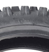 Close-up of the 2.50-10 Tire for 70cc Coolster QG-210 & 110cc QG-213A Dirt Bikes, highlighting its directional knobby tread pattern designed for optimal traction.