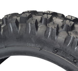 Close-up of a 2.50-10 Dirt Bike Tire with Directional Knobby Tread, highlighting its rugged knobby pattern designed for better traction, suitable for various mini dirt bikes.