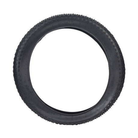 26x4.0 Tire for the Coleman DT200 Drift Trike, showcasing a rugged design with staggered corner lugs and wide-spaced knobs for optimal traction on various surfaces.