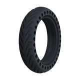 8.5 x 2 Solid Honeycomb Tire for the Xiaomi Mi M365 Electric Scooter, featuring visible shock-absorbing holes around the radius and a durable tread pattern for flat-free performance.