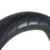 Close-up of the 200x50 (8x2) solid tire for Ninebot by Segway electric scooters, showcasing its low-siped street tread designed for hard city pavement.