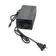 24 Volt 1.5 Amp 2.1 mm ID Coaxial Battery Charger with black rectangular body, attached power cord, and plug.