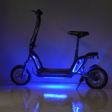 Multi-Color LED Light Kit for Recreational Scooters, showcasing a scooter with blue lights, highlighting a close-up of a wheel and reflective wet floor, emphasizing the vibrant and customizable lighting effects.