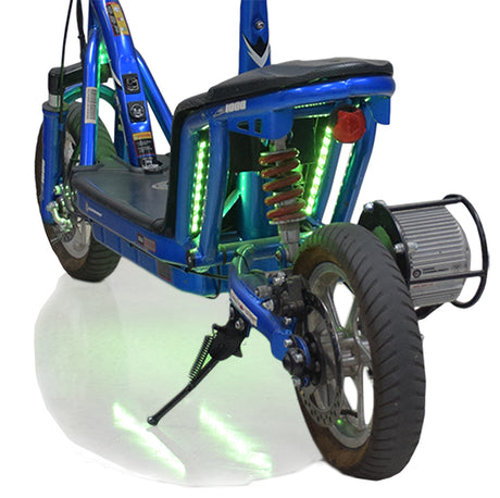 Multi-Color LED Light Kit for Recreational Scooters shown on a blue scooter with green lights, featuring visible tires, wheels, and fenders, enhancing the scooter's appearance with vibrant, customizable lighting effects.