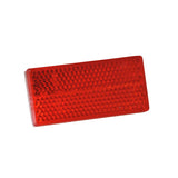 Red Reflector for the Pride Legend XL (SC3450) Mobility Scooter, featuring a rectangular shape with strong adhesive backing for easy attachment, ensuring safety and visibility during low-light conditions.