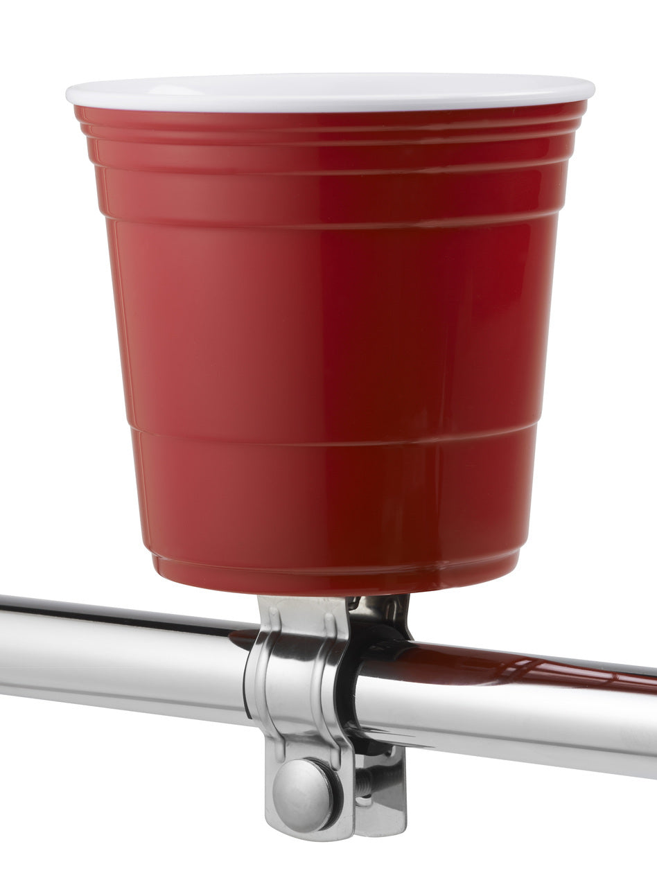 Red Cup Living Bicycle Drink Holder mounted on a metal pipe, featuring a red plastic cup with a white rim, illustrating its secure clamp-on design and durable build.