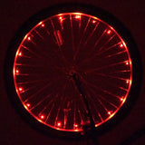 LED Bicycle Rim Spoke String Lights on a bicycle wheel, featuring a visible red light. The lights enhance visibility and safety, with easy installation around the wheel.