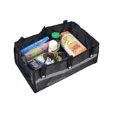 Under-Seat Tote Bag for Drive Medical Rollators 726, 728, & 10261, showing a black bag containing various food items, including rice crackers and a bottle, secured under a rollator seat.